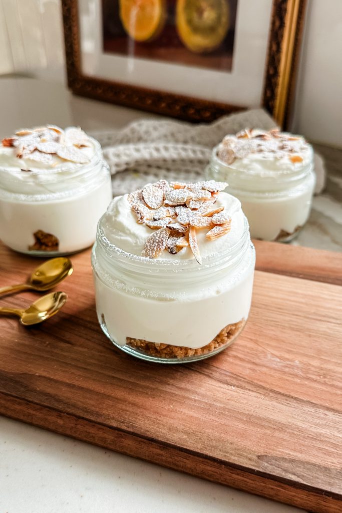 Cottage cheese and greek yogurt blended and placed in a jar with sliced almonds on top