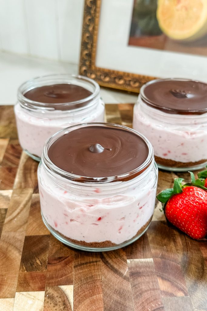 melted chocolate added to the top of the jars