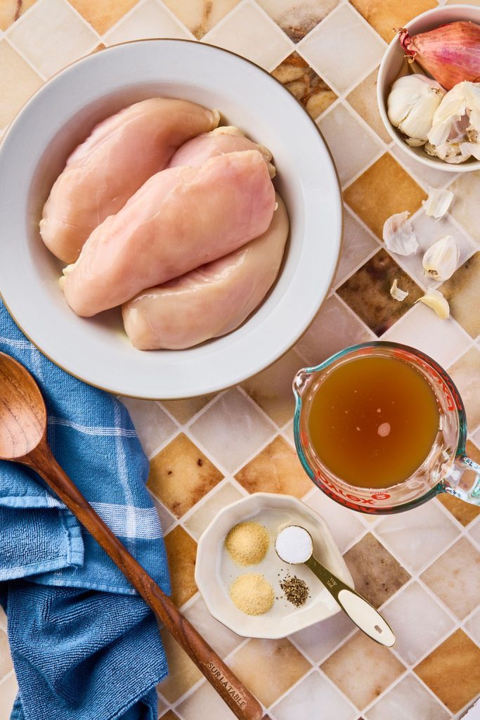 all the ingredients to make crockpot bone broth shredded chicken
