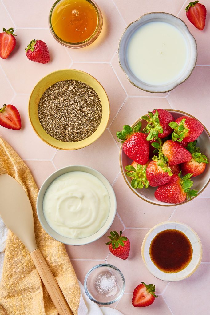 all the ingredients to make strawberry vanilla chia pudding
