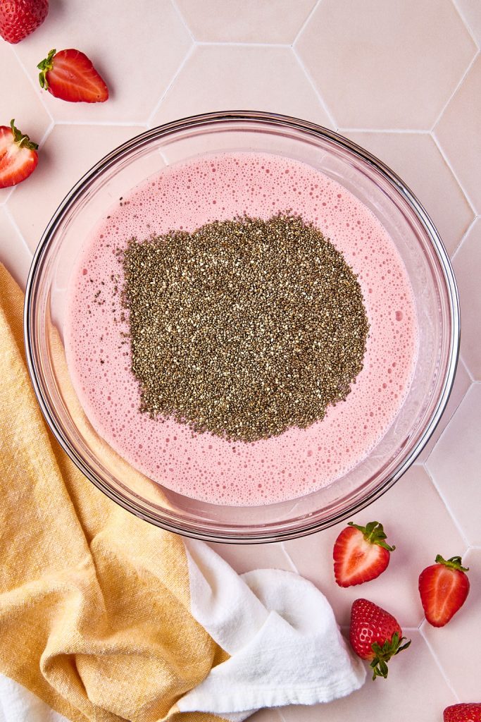 chia seeds added to strawberry pudding mixture