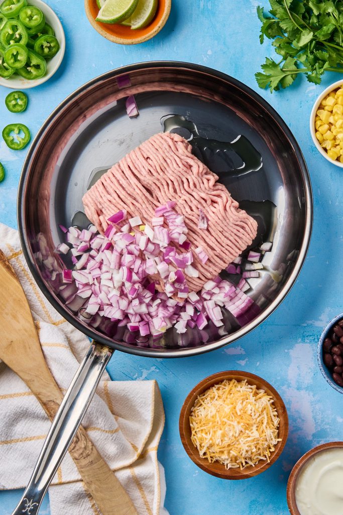 ground turkey onion and olive oil in a sauce pan