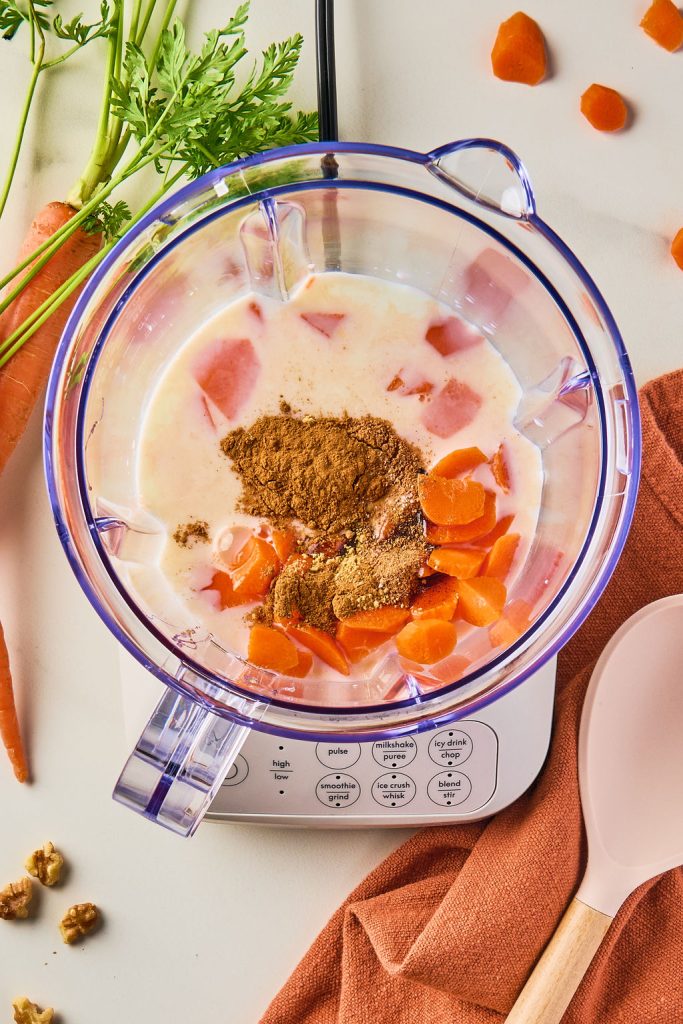 milk, honey, vanilla bean paste, carrots, cinnamon, nutmeg, ginger, and salt in a blender