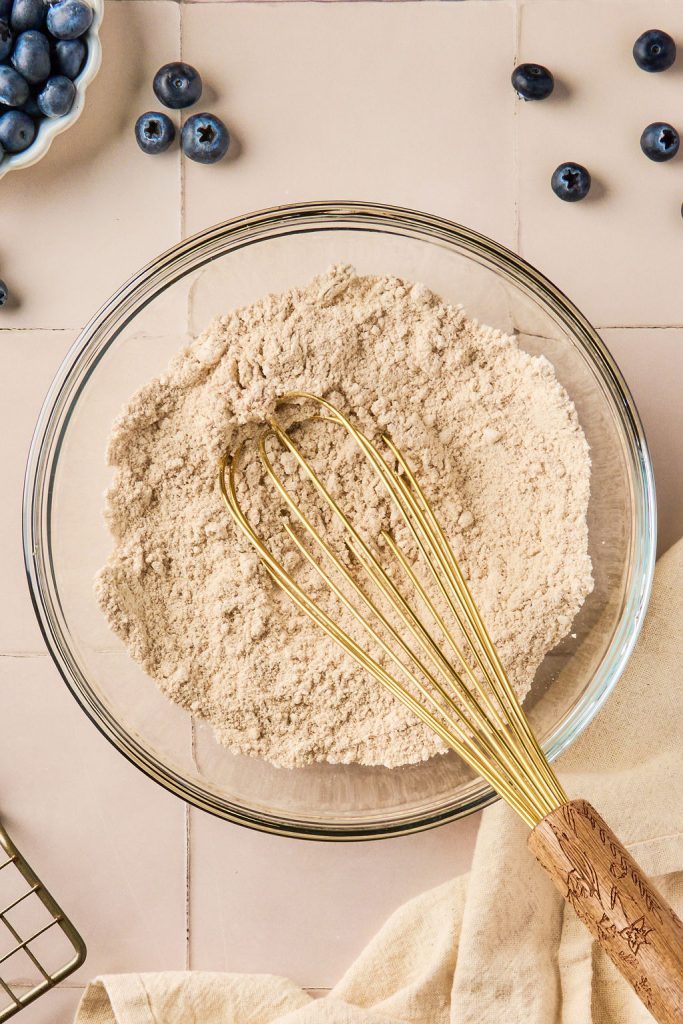 oat flour, baking soda, and cinnamon whisked together in a bowl