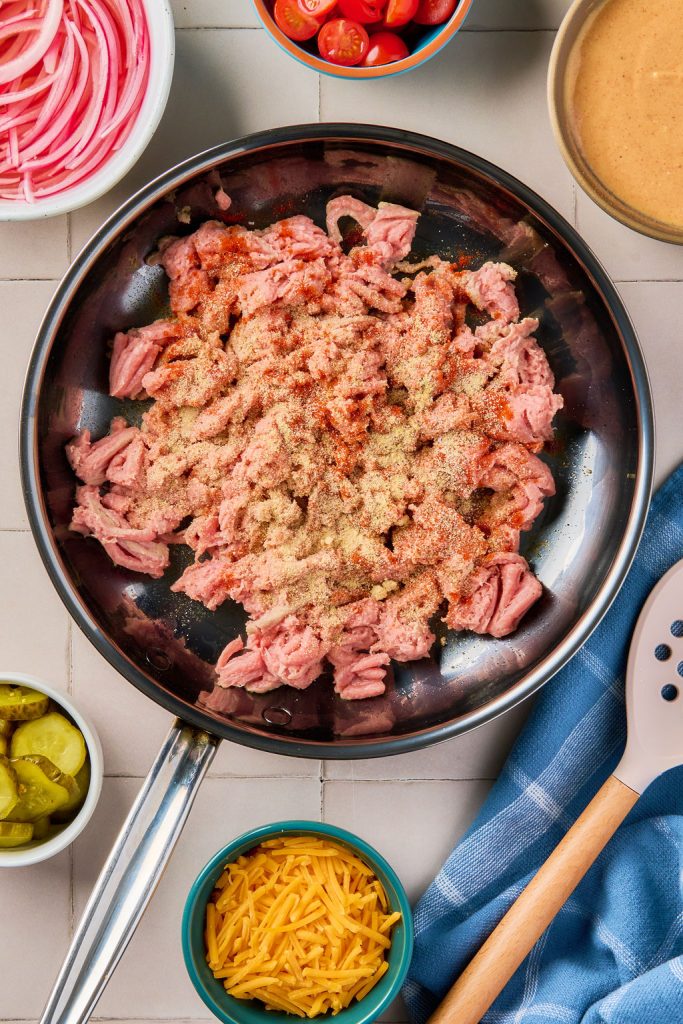 ground turkey in a skillet with seasonings