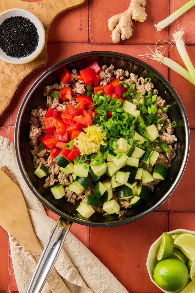 veggies added to the ground turkey in the skillet