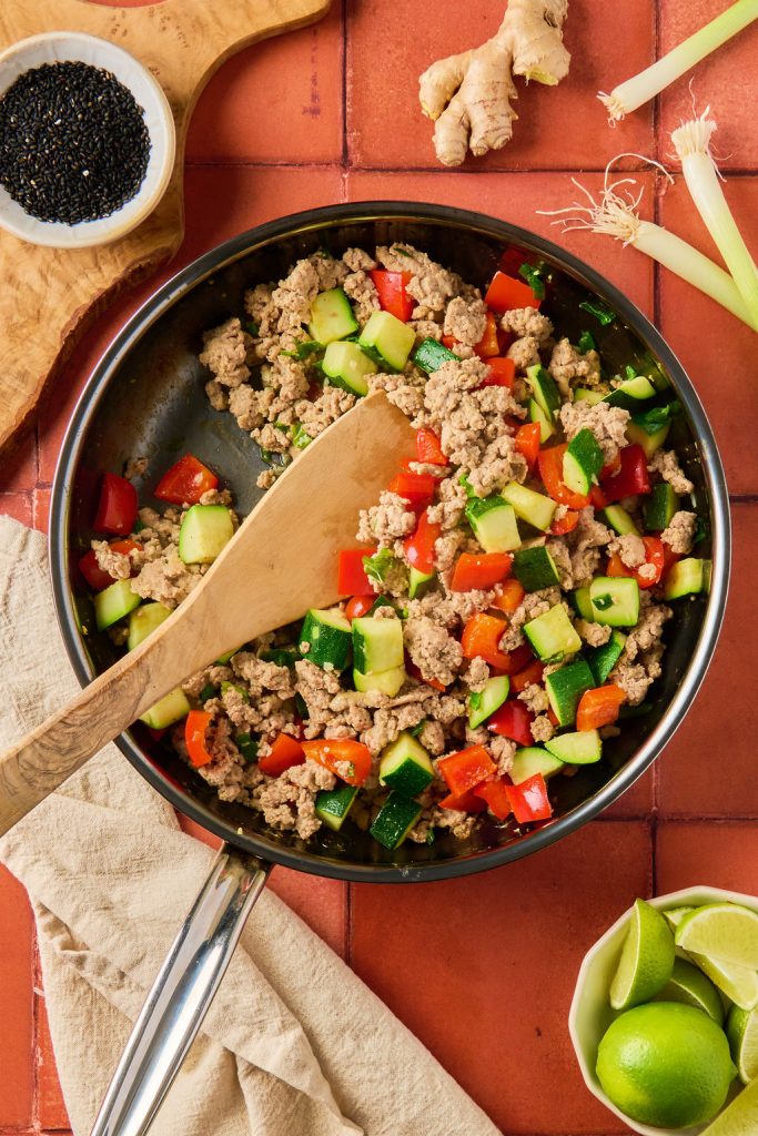 veggies and ground turkey fully cooked in a skillet