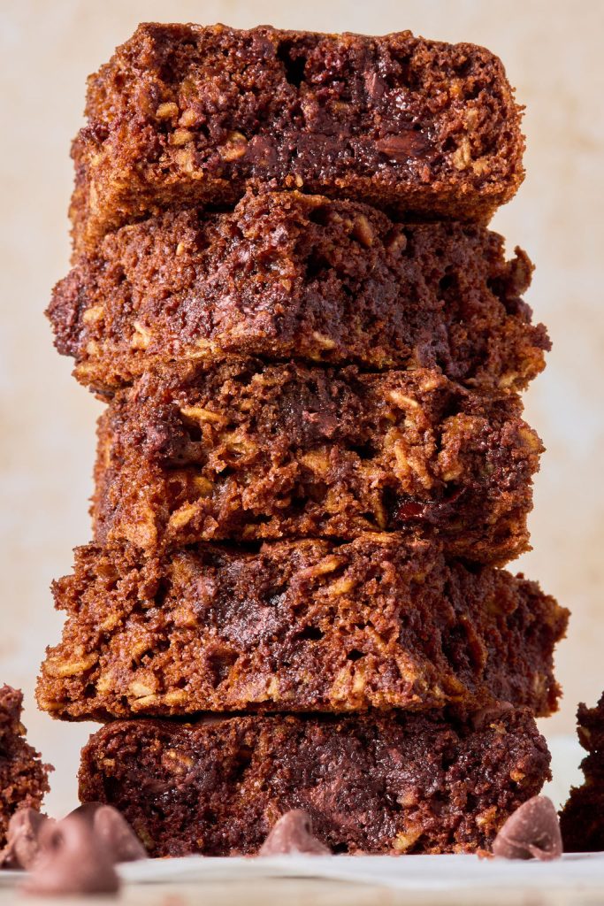 double chocolate oatmeal brownies stacked on top of each other