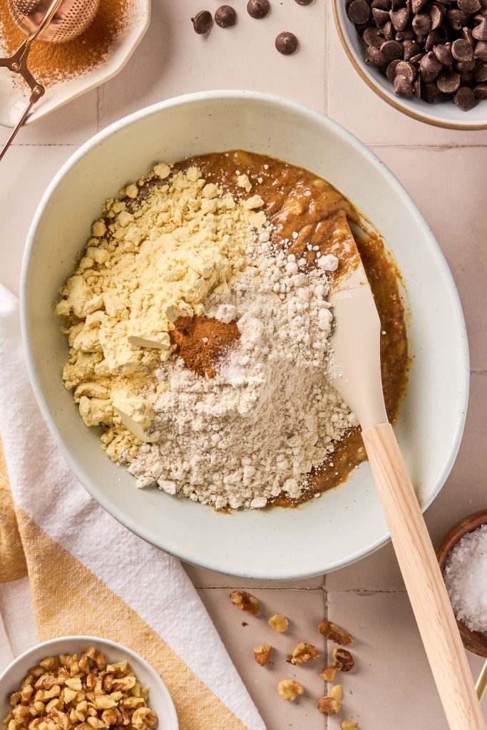 dry ingredients added to wet ingredients in a bowl