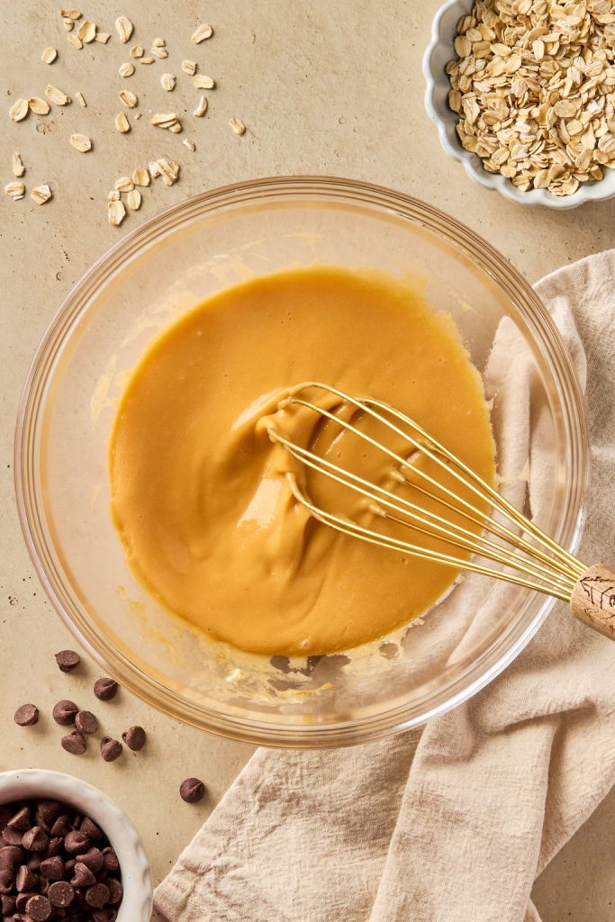 all wet ingredients whisked together in a glass bowl
