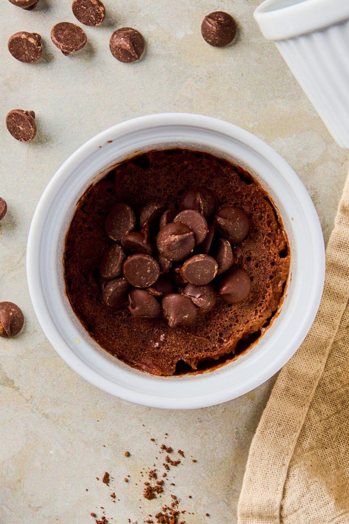chocolate chips added to the cooked batter in a ramekin