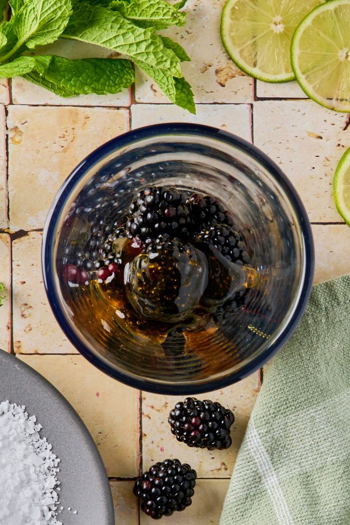 blackberries and agave nectar in a glass