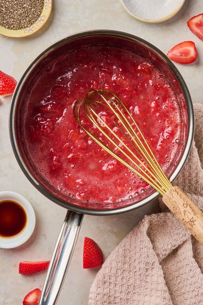 gelatin mixed in to the heated strawberries in the pan