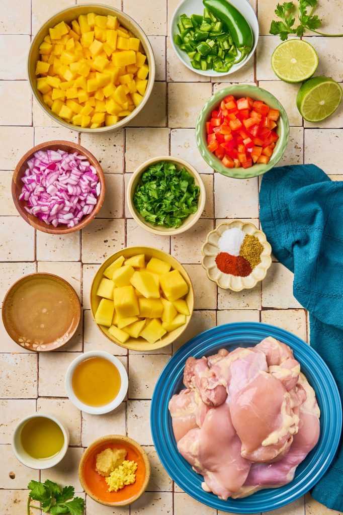 all the ingredients to make mango marinated chicken and mango salsa