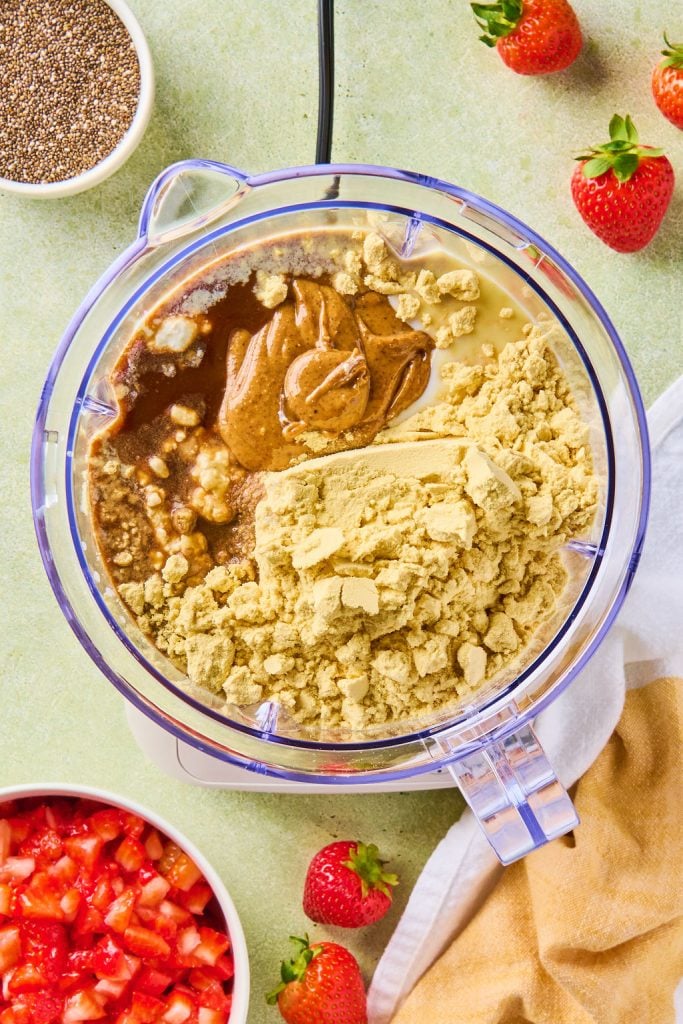 milk, peanut butter, Greek yogurt, cottage cheese, maple syrup, protein powder, vanilla and salt in a blender