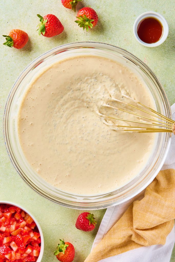 chia seeds mixed into the pudding mixture with a whisk