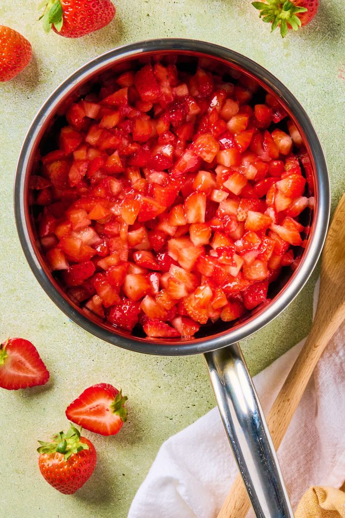 chopped strawberries in a sauce pan