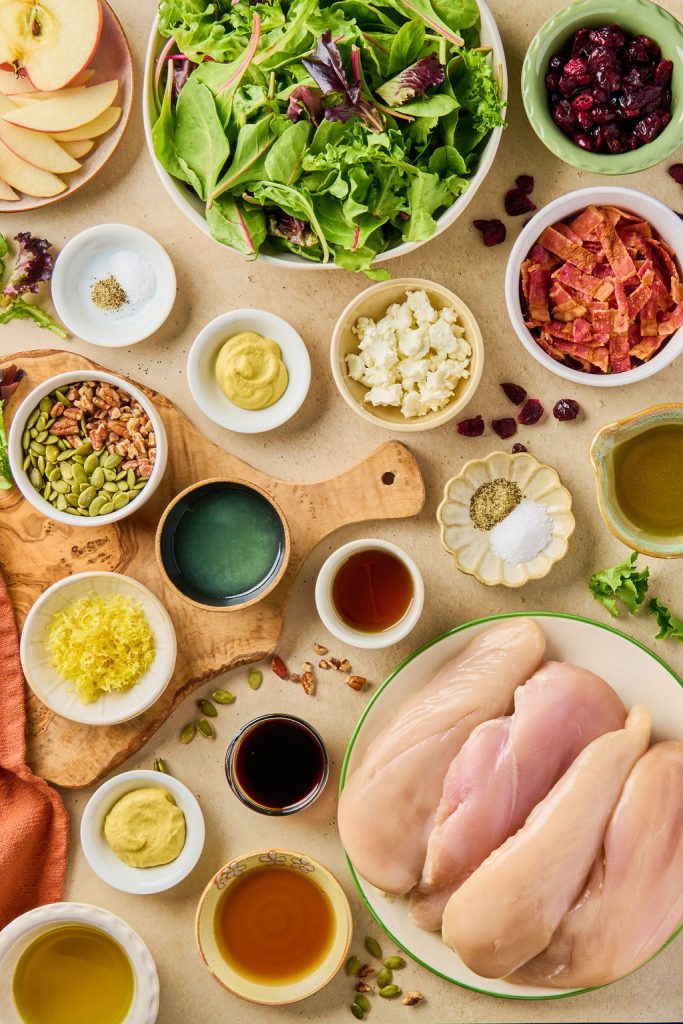 all the ingredients to make chicken and cranberry salad with maple dijon dressing