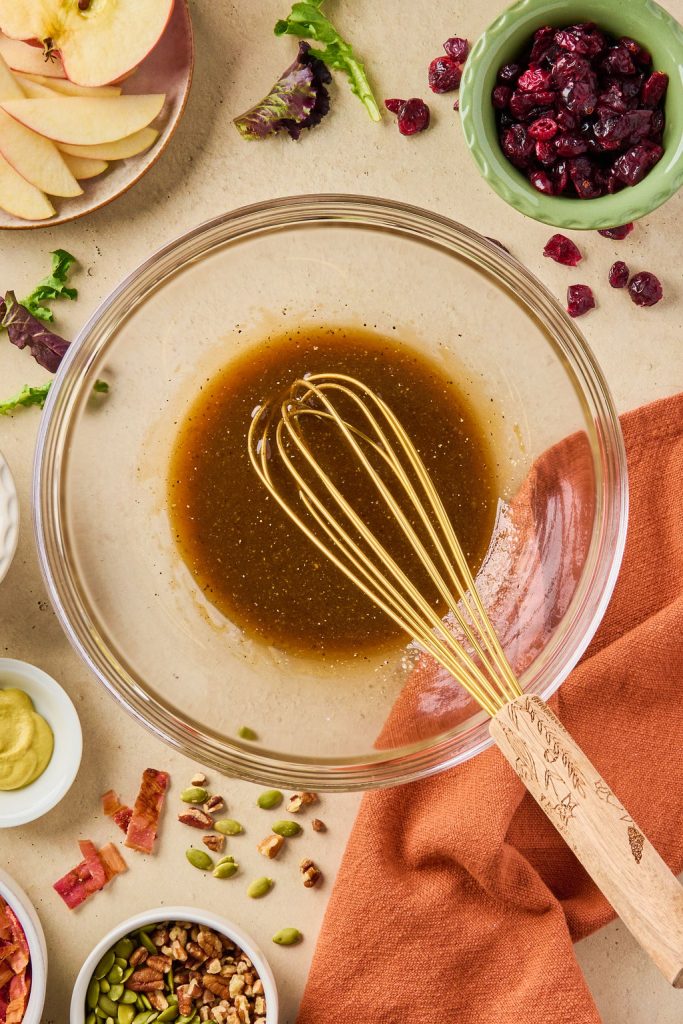 all there marinade ingredients whisked together in a glass bowl