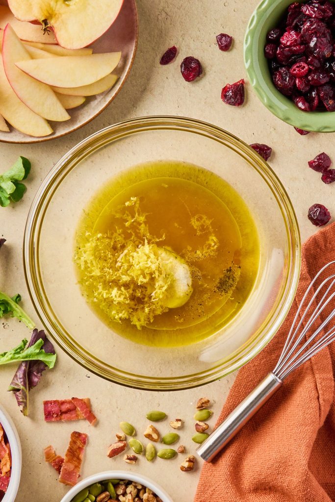 all the dressing ingredients in a glass bowl
