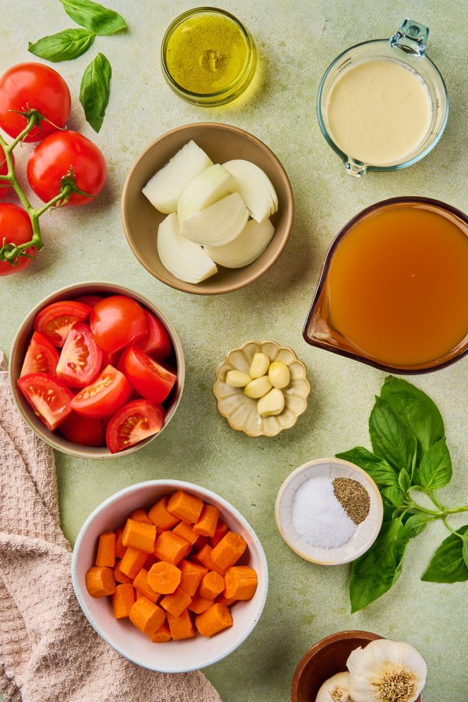 all the ingredients to make carrot tomato soup