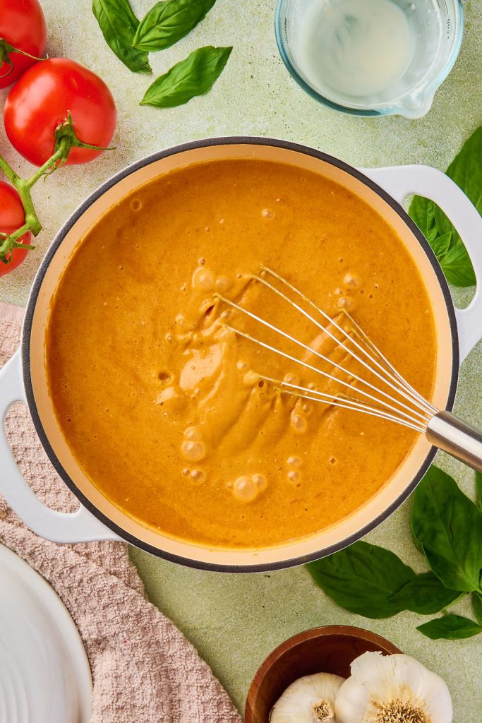 coconut cream whisked into veggie mixture to form creamy carrot tomato soup