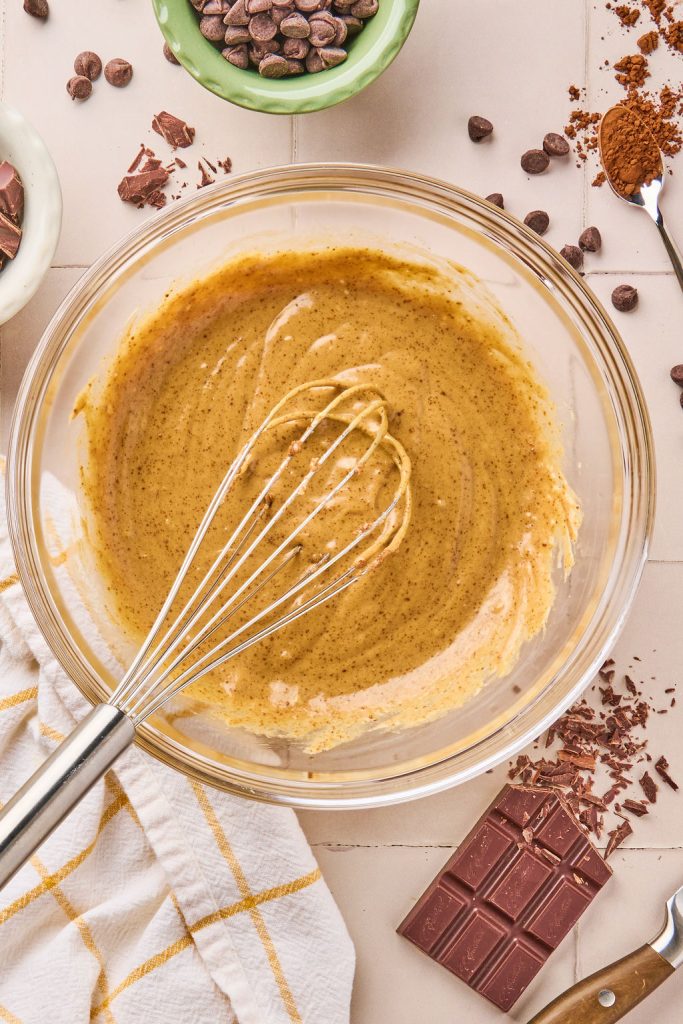 tahini, Greek yogurt, egg, vanilla and espresso powder whisked into the sugar mix until smooth