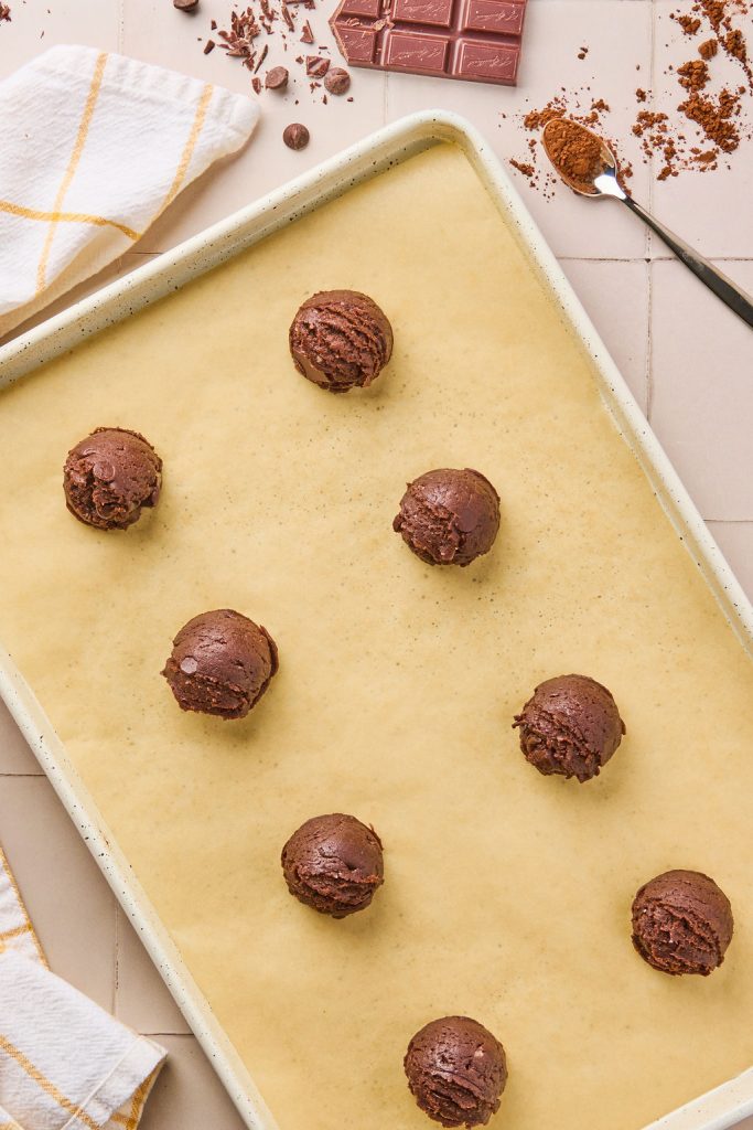 cookie dough scooped onto baking sheet