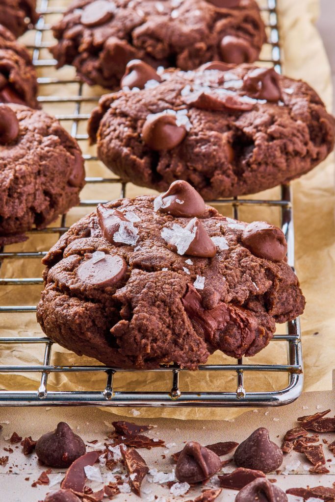 close up of brownie batter tahini greek yogurt cookies cooling on a rack