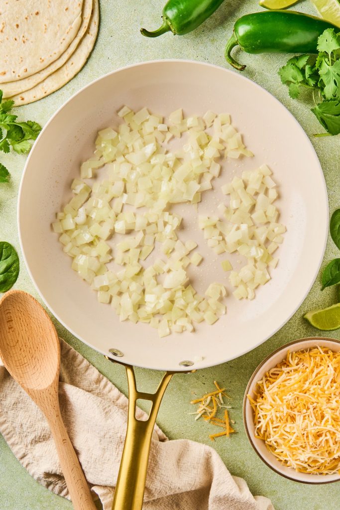 diced onion in a skillet