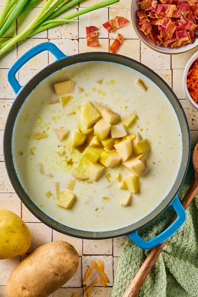 potatoes, milk and bouillon added to the pot